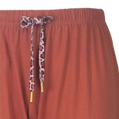 Roze pyjama broames pyjama broek met elastische tailanter print koord met gouden uiteinden