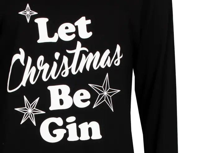 Zwart nachthemd met witte tekst 'Let Christmas Be Gin' en sterren, lange mouwen zichtbaar