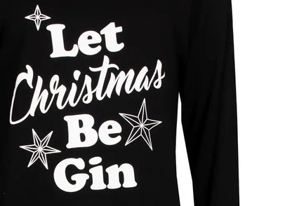 Zwart nachthemd met witte tekst 'Let Christmas Be Gin' en sterren, lange mouwen zichtbaar