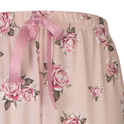 Roze blobloemenprint, elastische taille en roze lint als detail. Zacht en comfortabel ontwerp.