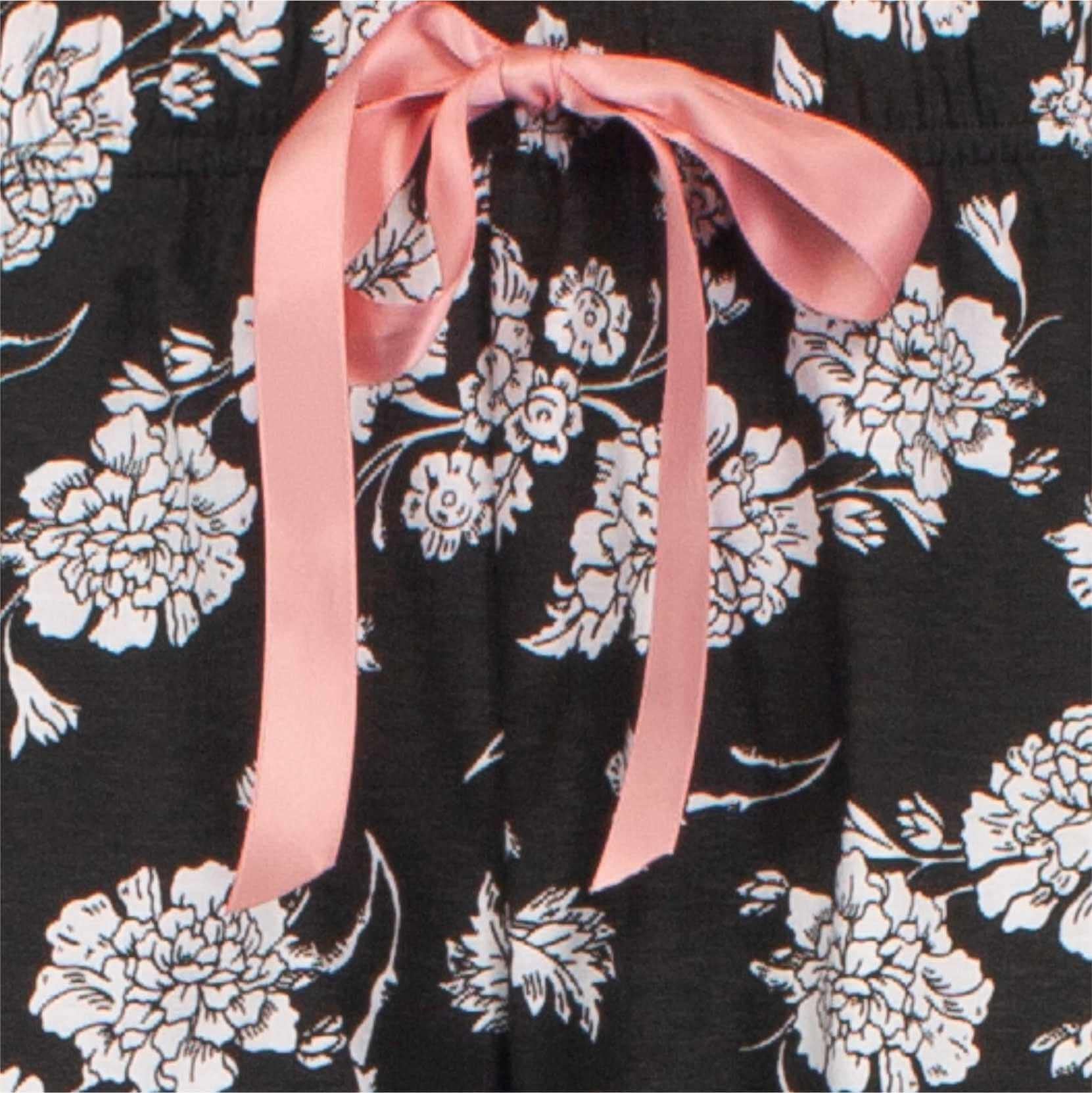 Zwarte pyjama met witte bloemenprint en roze lint, gemaakt van katoen voor dames