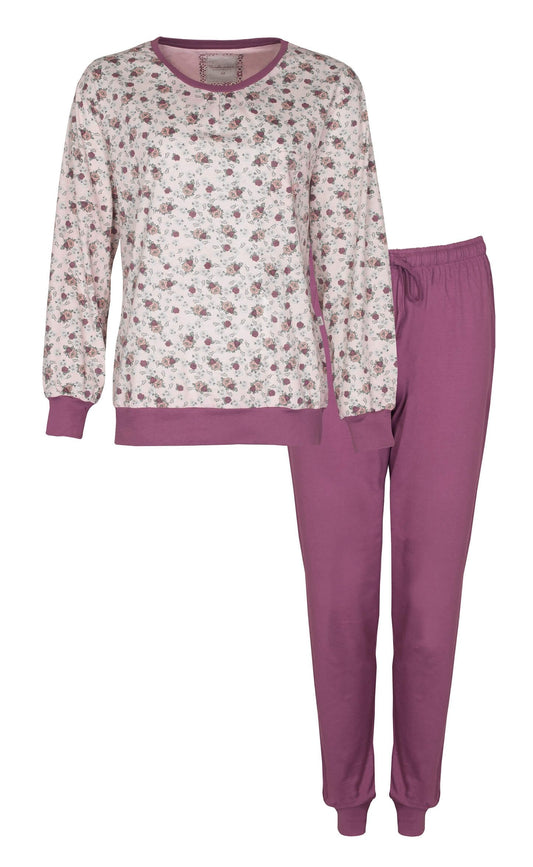 Roze dames pyjama met bloemenprint op het shirt en effen roze broek, gemaakt van 100% katoen.