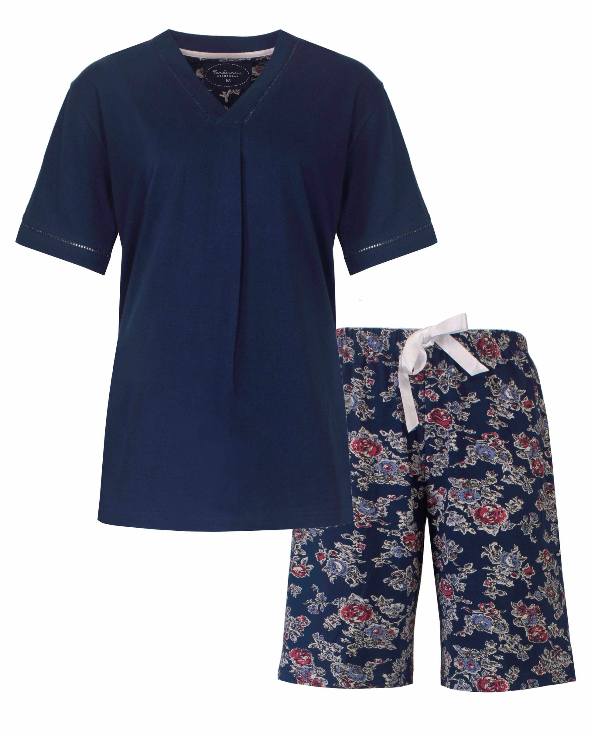 Marineblauwe dames shortama met korte mouwen en bijpassende bloemenprint shorts met wit koordje